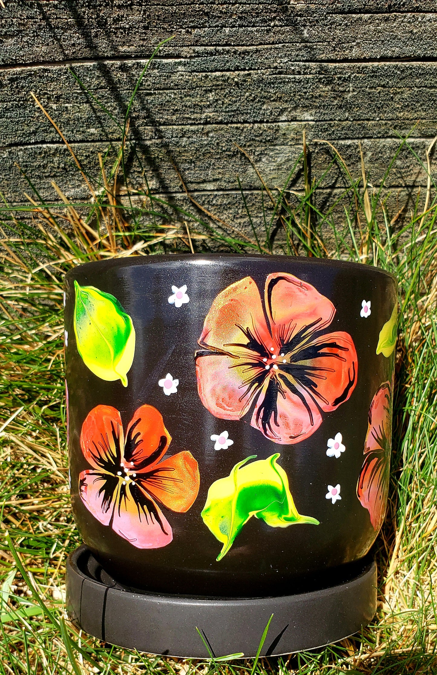 Black Planter with Red Flower design